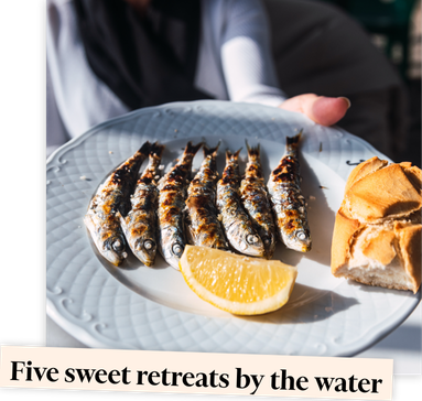 Image of sardines and a lemon overlaid with a text banner reading "Five sweet retreats by the water"